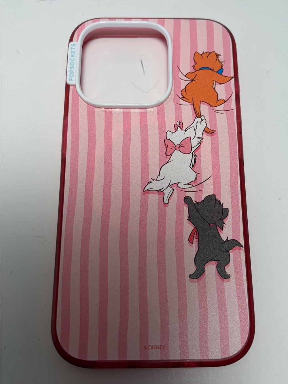 This is a fun pink phone case with Disney Aristocats.